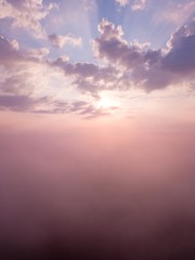 Fototapeta premium Beautiful foggy sunrise landscape from drone.