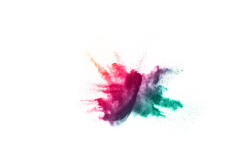 abstract powder splatted background. Colorful powder explosion on white background. Colored cloud. Colorful dust explode. Paint Holi.