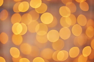 Golden beautiful blurred bokeh background with copy space.