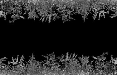 Natural ice crystals frostwork on dark backround. Macro closeup.