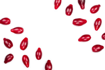 Red berries of cornel or dogwood isolated on white background with copy space for your text. Top view. Flat lay