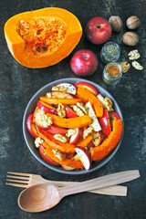 Pumpkin salad with apples and walnuts. Recipe for salad with pumpkin and apples. Vegan nutritious pumpkin salad. Healthy Apple Salad with Pumpkin and Nuts.