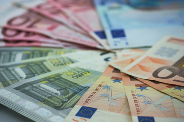 Euro banknotes, the currency of Europe sorted on a table