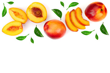 ripe nectarine with leaves isolated on white background with copy space for your text. Top view. Flat lay pattern