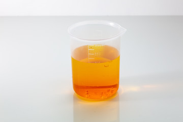Laboratory glassware with colorful chemical reagent in research laboratory