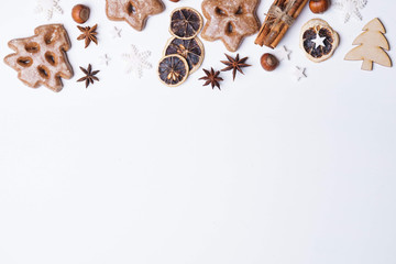 Christmas bakery, family festive culinary and New Year celebration traditions concept. Gingerbread cookies, spices and food decorations, flat lay