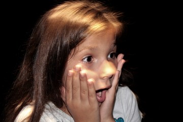 girl with hands on face