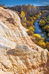 Fototapeta na wymiar The output of limy rocks of organic origin near the river. Western Siberia, Russia