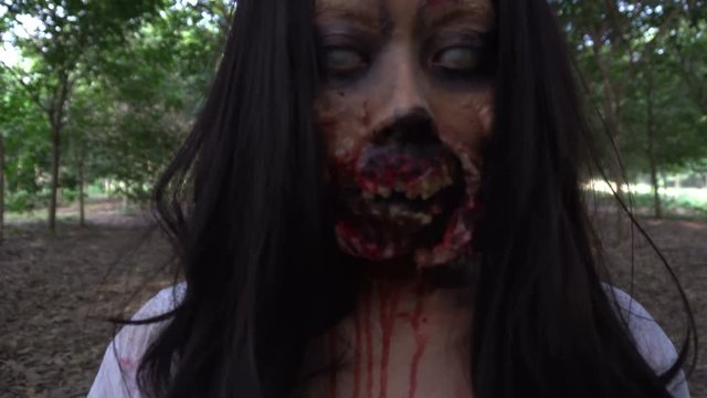 Portrait of asian woman make up ghost face,Horror scene,Scary background,Halloween poster	