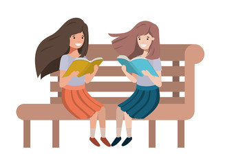 young students girls sitting reading book