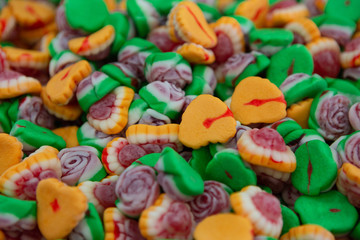 Fototapeta na wymiar Colorful Fruit Candy Close-up. Cheerful Mix Of Multi-colored Candies. Children's Holiday Concept.