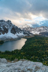 A ridge of snow covered peaks catches some late evening sunlight