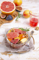 Salad from different raw fruits