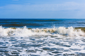 Powerful sea waves breaking, natural background