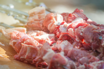 fresh raw fillet steak red meat on skewers barbecue