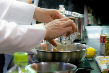 Chef preparing food, meal, in the kitchen, chef cooking, Chef decorating dish, closeup, .chef at work.
