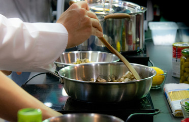 Chef preparing food, meal, in the kitchen, chef cooking, Chef decorating dish, closeup, .chef at work.