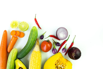 Top view of fresh vegetables on white table.