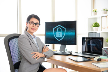 elegant office worker crossing her arms