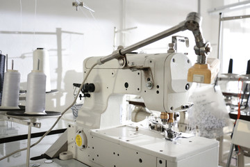 sewing machine in a white workshop