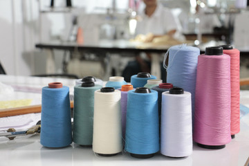 thread in spool on the tailor desk