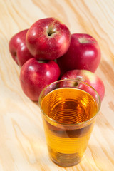 apples and glass of juice