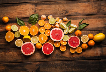 Fruit pattern of exotic citrus tropical fruits on wooden table