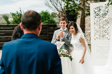 Mom, dad congratulates the brides with a marriage. man, woman we