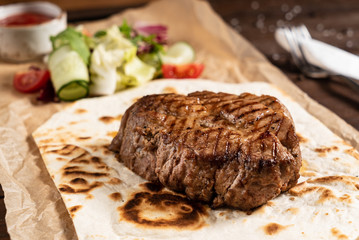 grilled steak with sauce