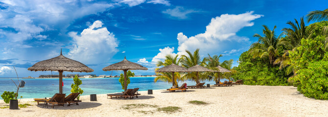 Sunbed and umbrella in the Maldives