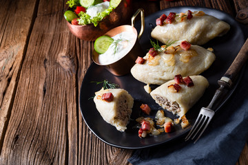 Rustic Cepelinai, a specialty Lithuanian and Polish cuisine.