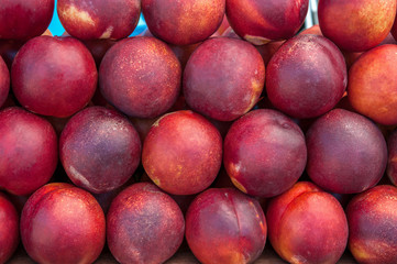 The farmer's crop of peaches is on display. Background.