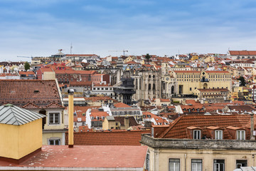 Fototapeta na wymiar Lisbon skyline viewed from the castle - the Elevador de Santa Justa can be seen in the distance