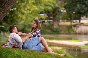 Couple in love enjoying picnic time