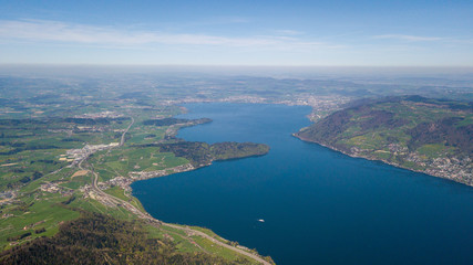 Fototapeta na wymiar aerial view of beautiful lake lucerne switzerland europe on calm sunny day