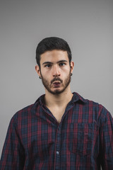 Obraz premium portrait of a boy putting on his cheeks