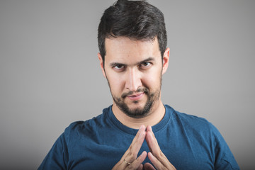 face of evil, with the hands of satisfaction