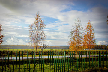 landscape with fence and blue sky