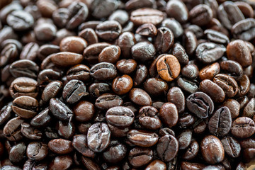 a lot of coffee beans for background, wallpaper, printing image, decorate interior or exterior. aroma drink. fragrance seed. spa therapy.