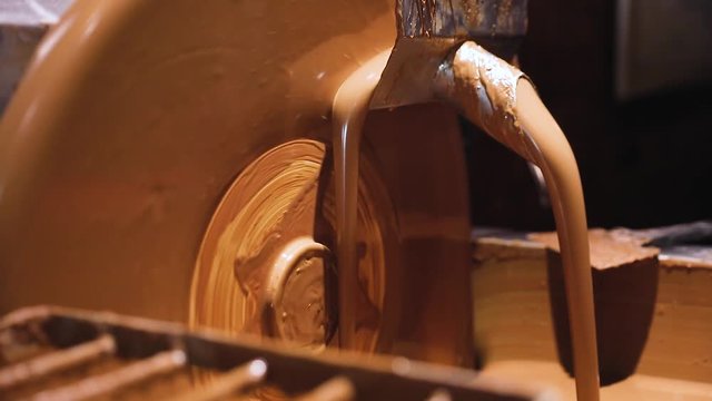 Chocolate Production At Factory. Melted Chocolate Closeup