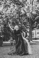 Halloween party concept, mysterious girl in black lace handmade dress . Beautiful young woman. Inspiration for halloween celebration, ideas and simple nice detail 