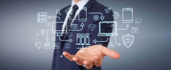 Businessman using tech devices and icons thin line interface