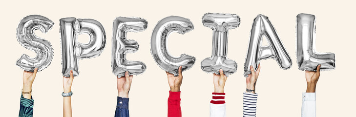 Silver gray alphabet balloons forming the word special
