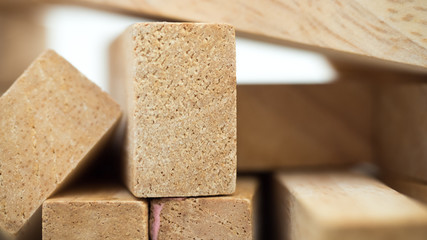 Close up wooden block on white background