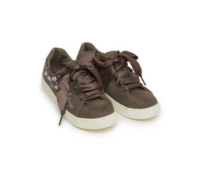 Woman sneakers isolated on the white background