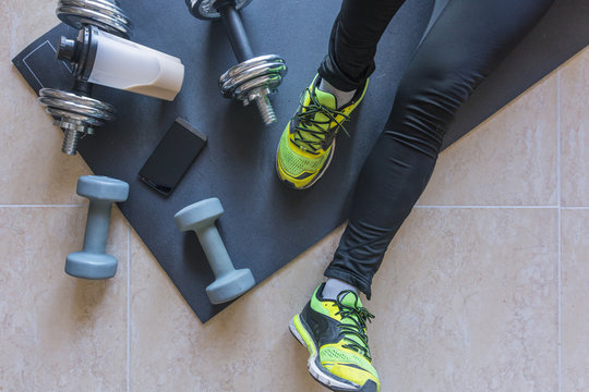 Dumbbell and mat training at home, - Powered by Adobe