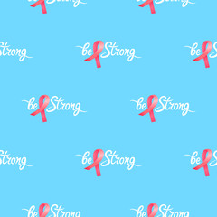 Be strong hand drawn motivational inscription with satin pink ribbon seamless pattern. National Breast Cancer Awareness Month symbol.