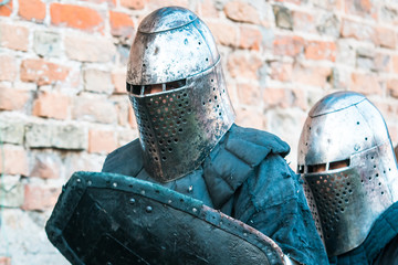 Two knights in armor.