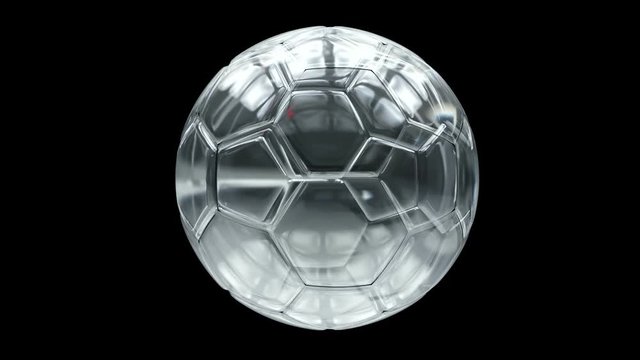 Crystal glass rotating soccer ball. Loop ready animation of crystal glass soccer ball with light flickering in its walls. With black and white mask.