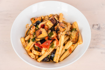 Italian food - pasta alla norma, traditional Sicilian pasta with eggplants and tomato sauce